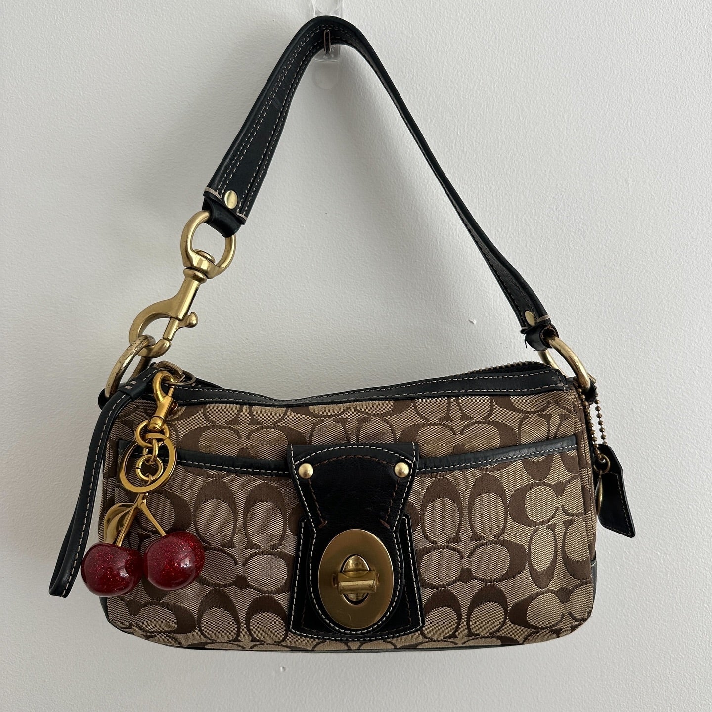 Coach legacy turnlock monogram bag