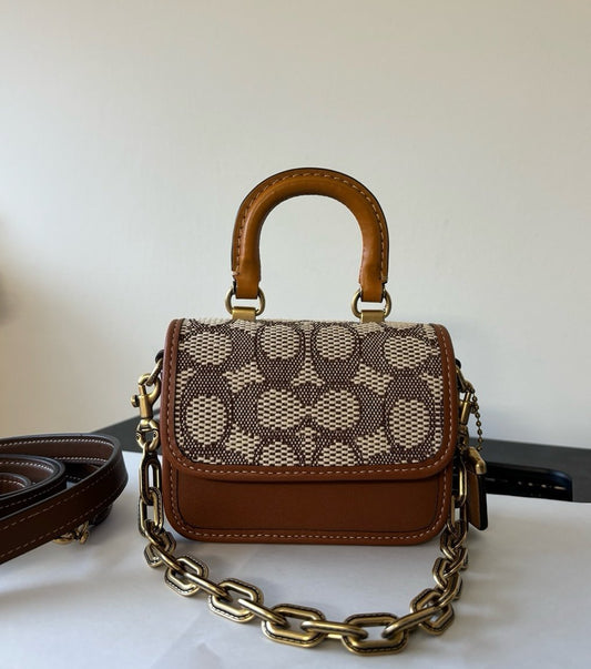 Coach Rogue Top Handle Bag 12 In Signature Textile Jacquard