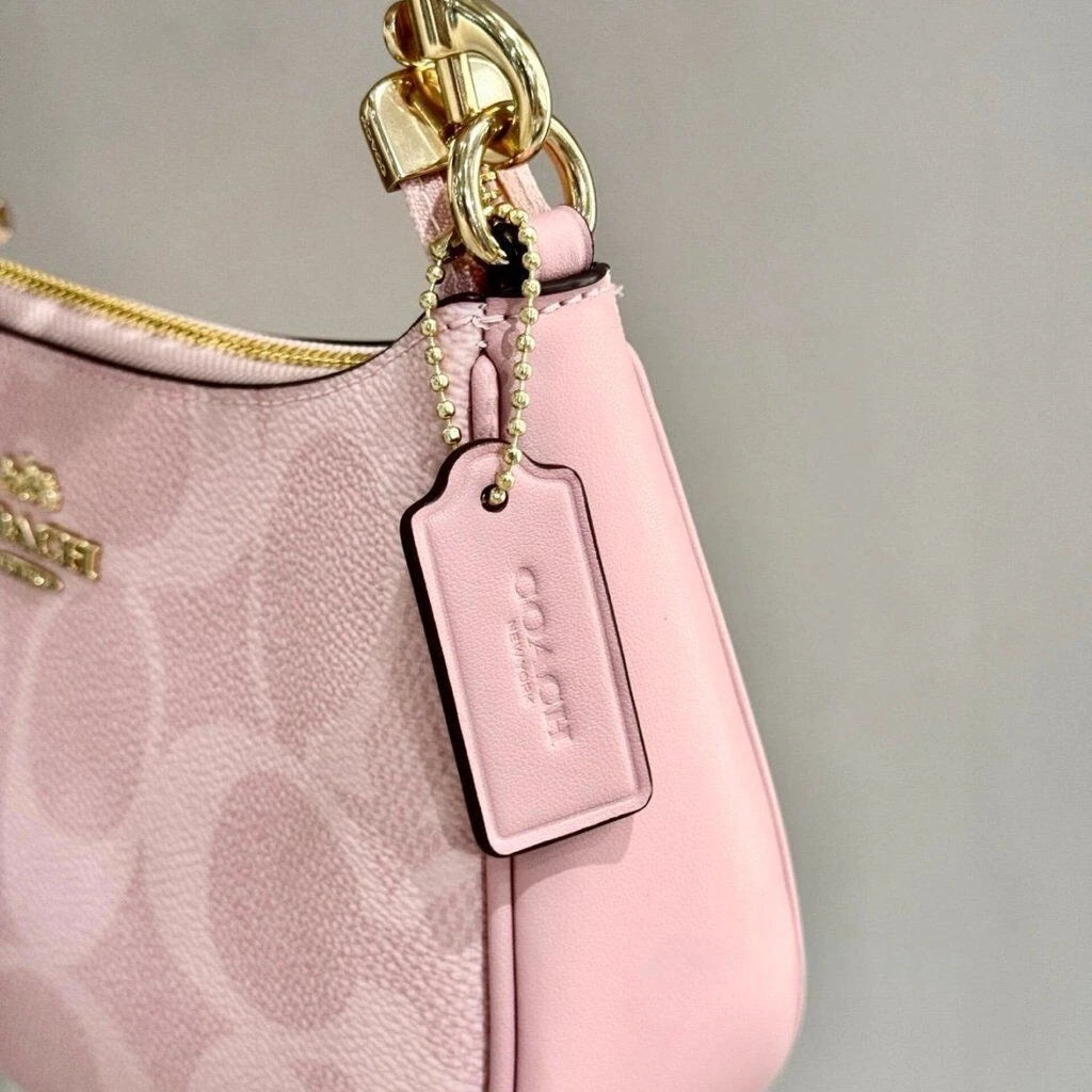 2026 New COACH TERI SHOULDER BAG IN SIGNATURE CANVAS Pink